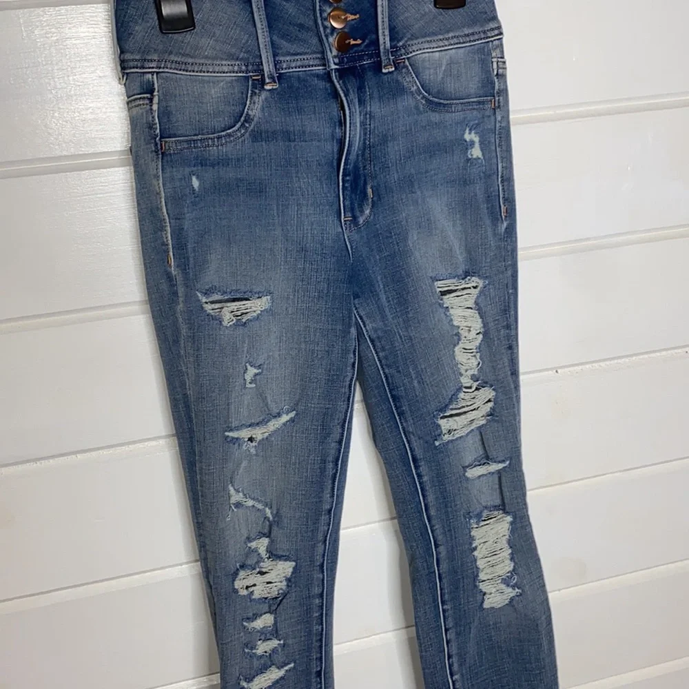 American Eagle super hi rise distressed skinny jeans